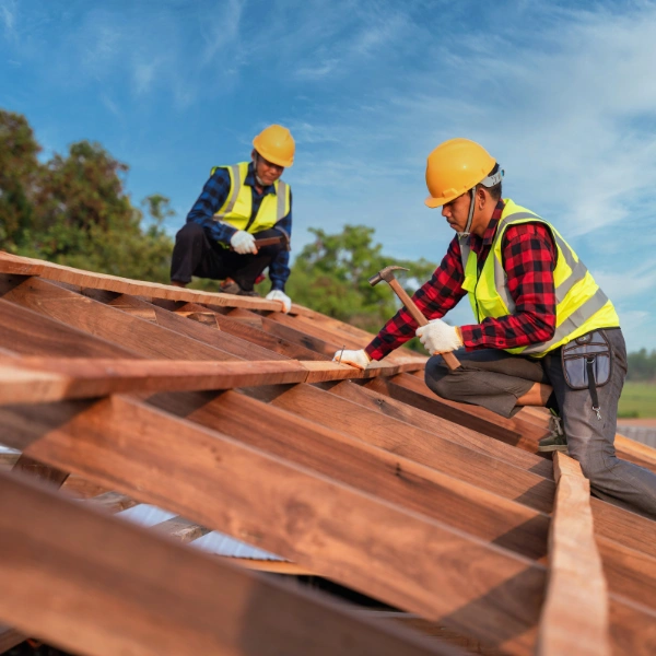 A photograph showing the installation of drip edge and underlayment on a roof.